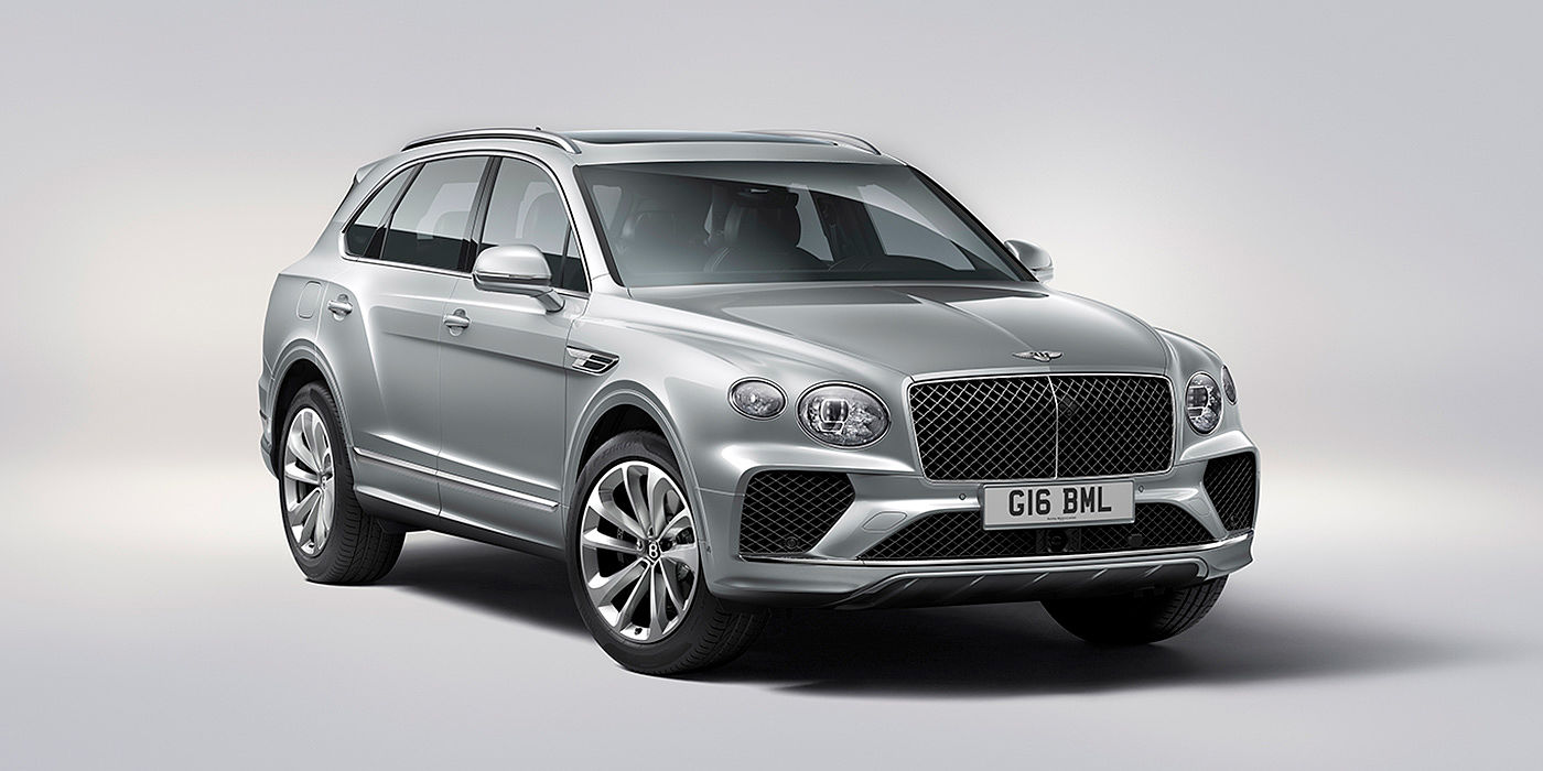 Bentley Kaohsiung Bentley Bentayga in Moonbeam paint, front three-quarter view, featuring a matrix grille and elliptical LED headlights.