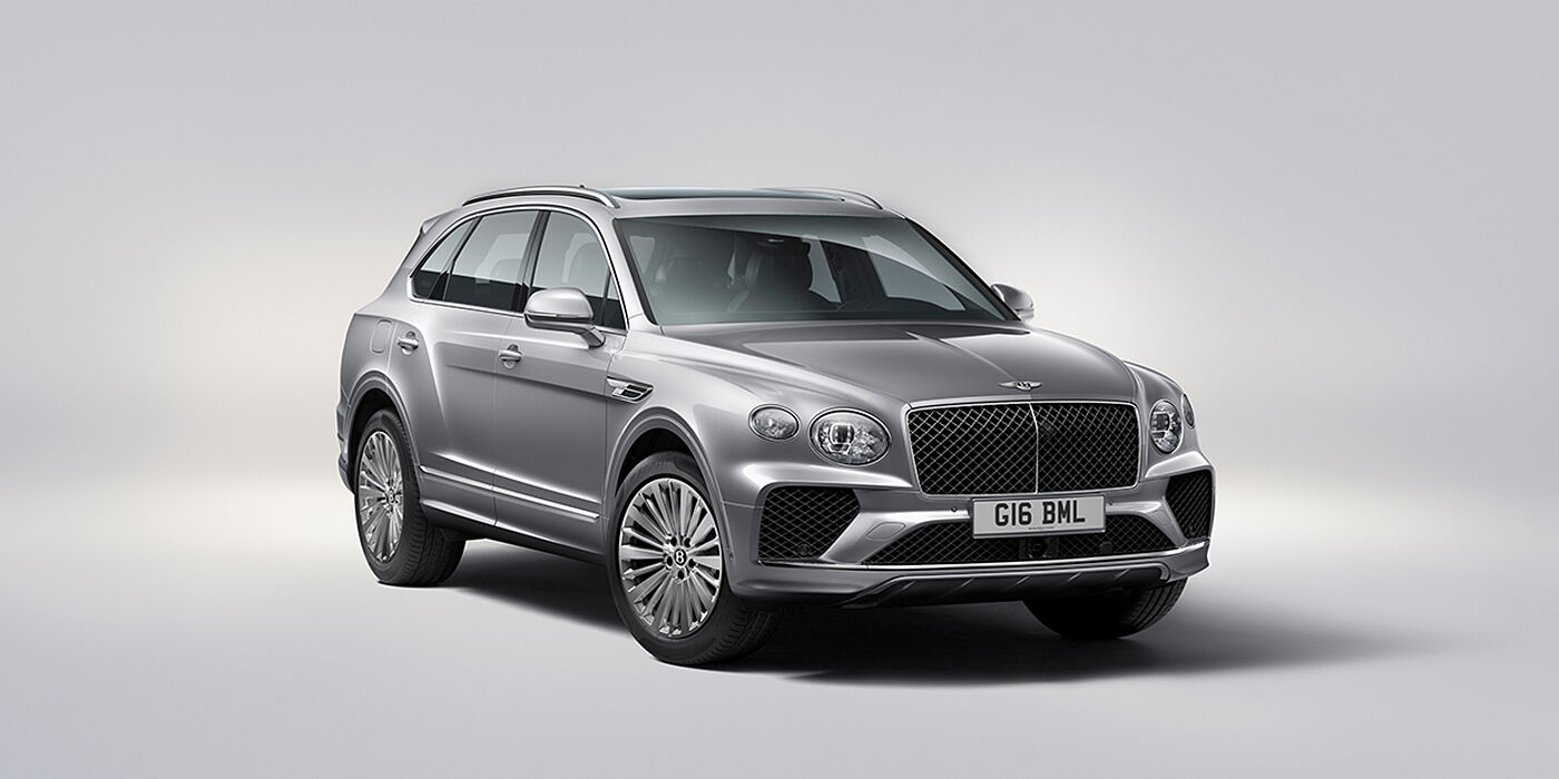 Bentley Kaohsiung Bentley Bentayga luxury SUV front three quarter view in Moonbeam paint with matrix grille and 21″ 5 spoke painted wheels