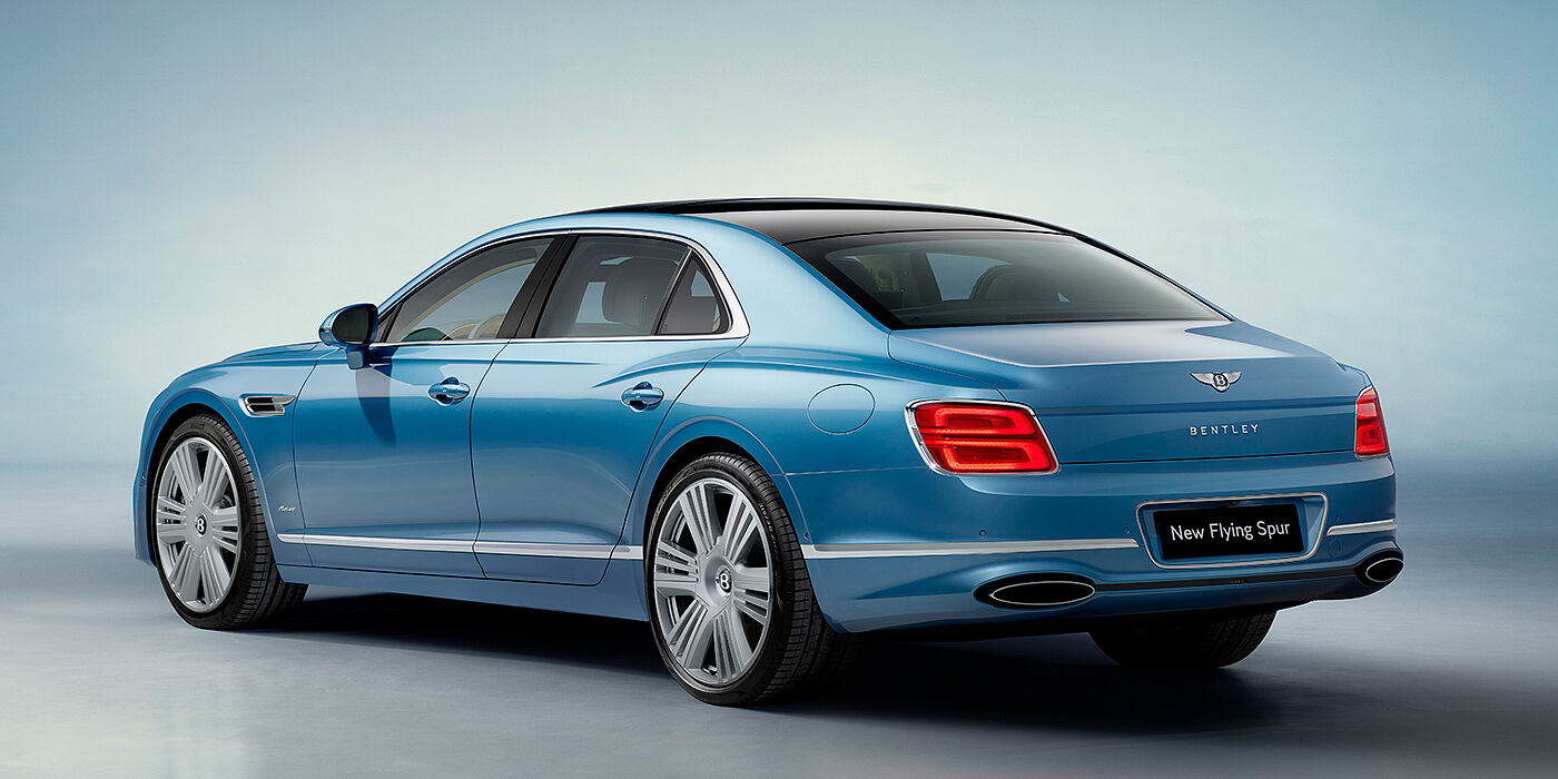 Bentley Kaohsiung New Bentley Flying Spur Azure sedan rear view in Light windsor blue by Mulliner paint with 22 inch Azure wheels and chrome exterior details