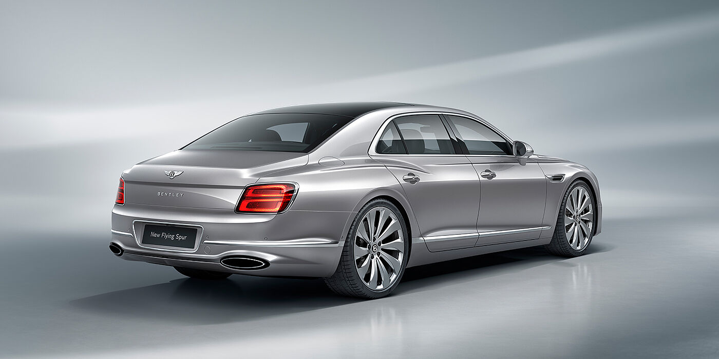 Bentley Kaohsiung New Bentley Flying Spur sedan rear view in Silverlake paint with ten spoke wheels and chrome matrix grille