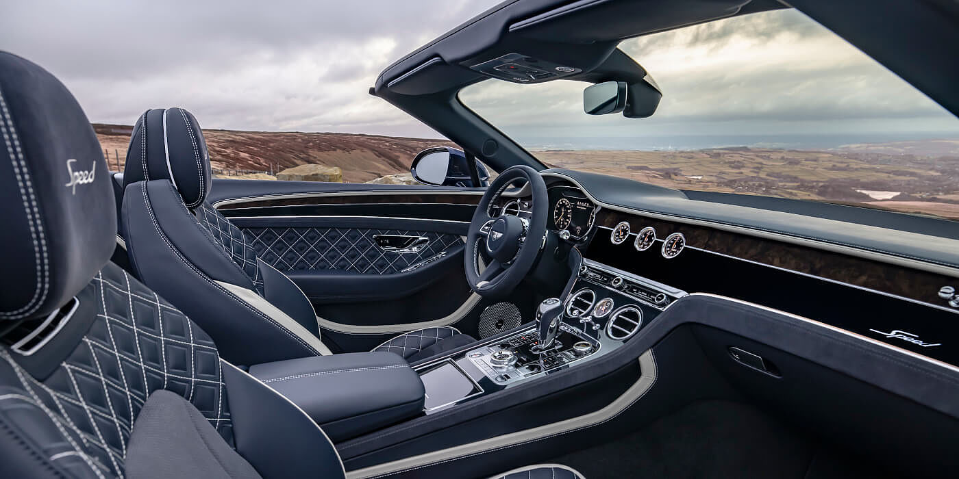 new-bentley-continental-gt-speed-convertible-front-cabin-imperial-blue-and-linen-hide-in-peak-district