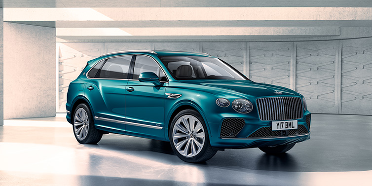 Bentley Kaohsiung Bentley Bentayga Extended Wheelbase Azure SUV front three quarter in Topaz blue paint colour with a grey background