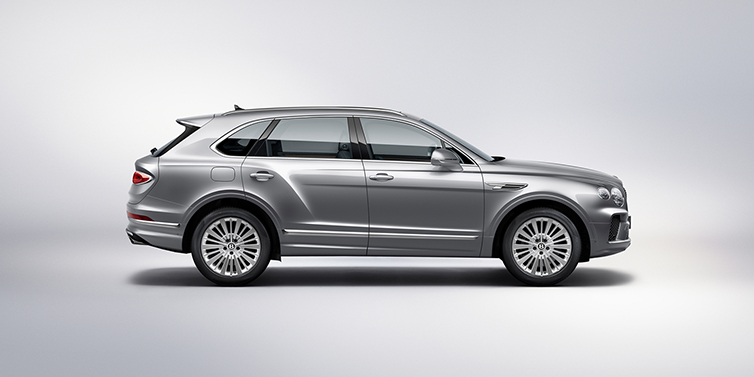 Bentley Kaohsiung Bentley Bentayga SUV side profile in Moonbeam silver paint against white background featuring 21 inch 5 spoke wheels